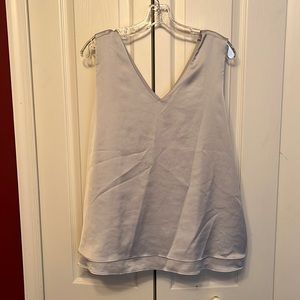 Sleeveless silver vneck top